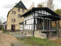 Der einsitige Schuppen beherbergt nun das Café.